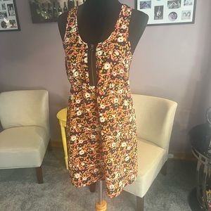 Floral dress with zip front and lace racer back.